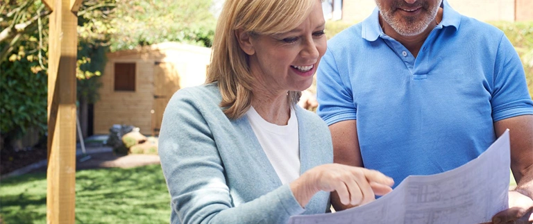 woman showing landscape design