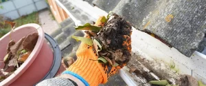 cleaning the gutter