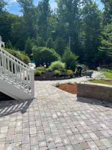 man working on lawn bed