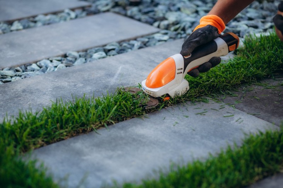 Gardening using lawn trimming tools